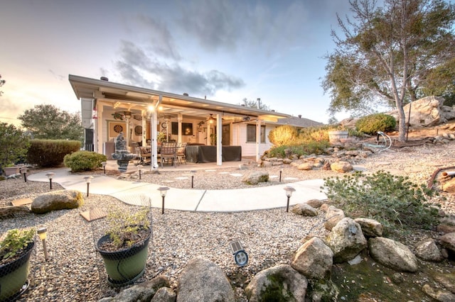 back of house featuring a patio area