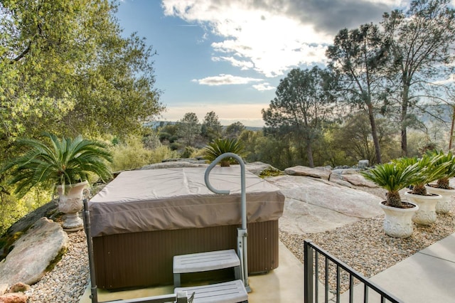 view of patio with a hot tub