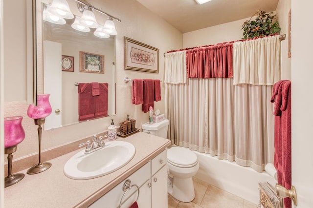 full bathroom with tile patterned floors, toilet, vanity, and shower / bath combination with curtain