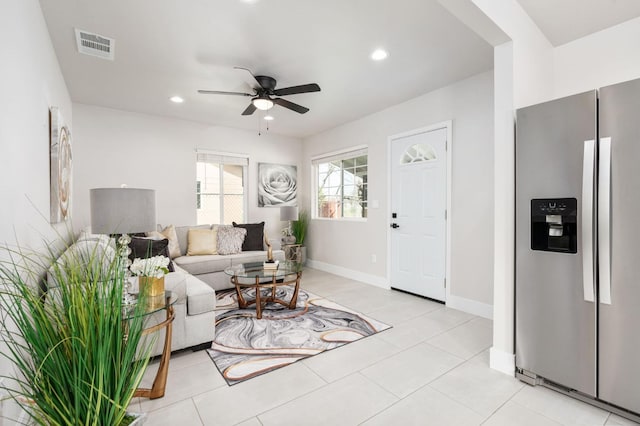 living room with ceiling fan, baseboards, visible vents, and recessed lighting