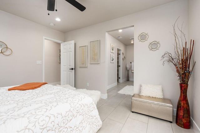 bedroom with a ceiling fan, visible vents, baseboards, and light tile patterned floors