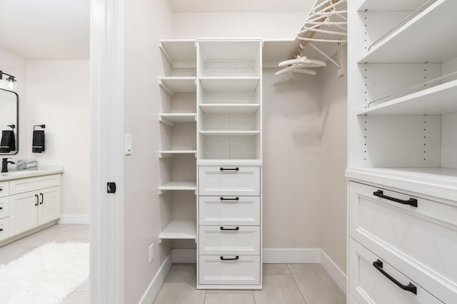 walk in closet featuring light tile patterned floors