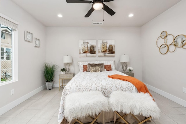 bedroom with light tile patterned floors, visible vents, baseboards, and recessed lighting