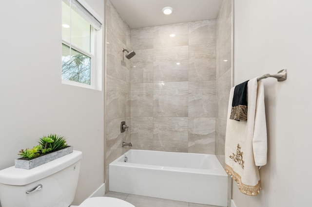 full bathroom with shower / bathing tub combination, tile patterned flooring, and toilet