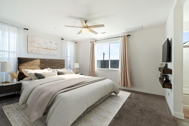 bedroom featuring ceiling fan, visible vents, and baseboards