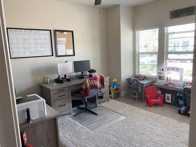 home office with light tile patterned floors