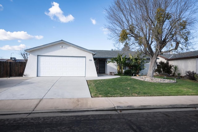 ranch-style house with driveway, stucco siding, an attached garage, fence, and a front yard