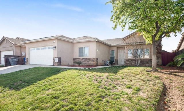 ranch-style house with stone siding, concrete driveway, a front lawn, and an attached garage