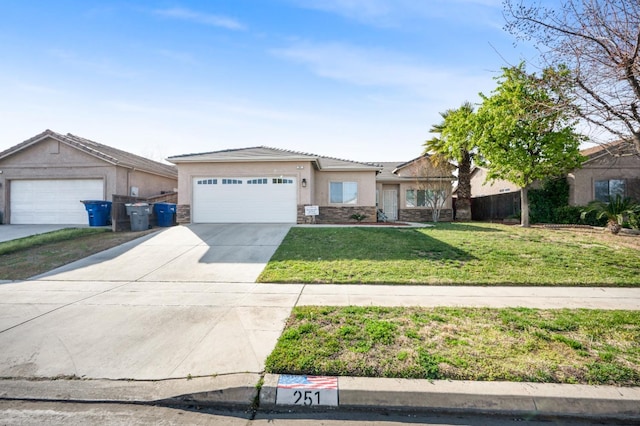 ranch-style house featuring concrete driveway, stone siding, an attached garage, a front lawn, and stucco siding