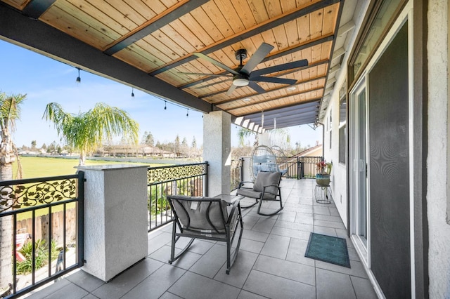 balcony featuring a ceiling fan