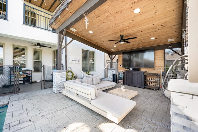 view of patio featuring a ceiling fan