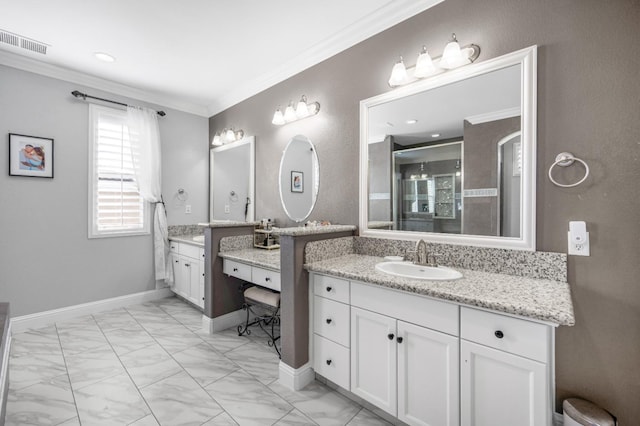 full bathroom featuring a sink, visible vents, baseboards, marble finish floor, and crown molding