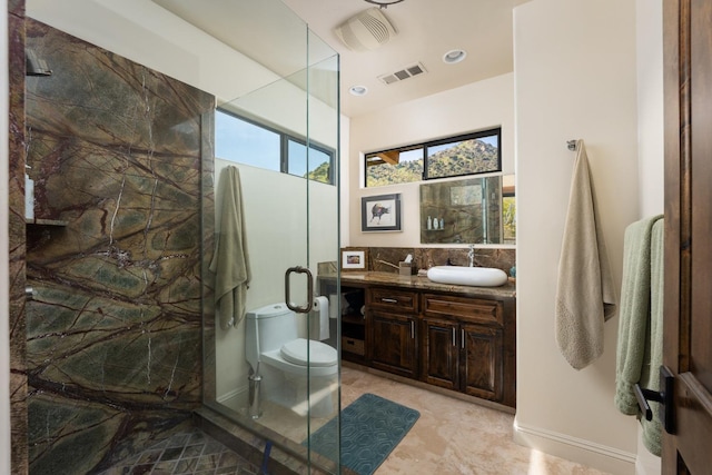 full bathroom featuring a marble finish shower, visible vents, toilet, vanity, and recessed lighting