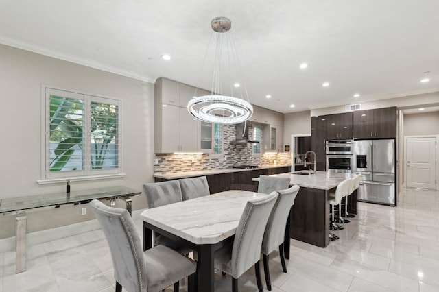 dining area with plenty of natural light, visible vents, crown molding, and recessed lighting