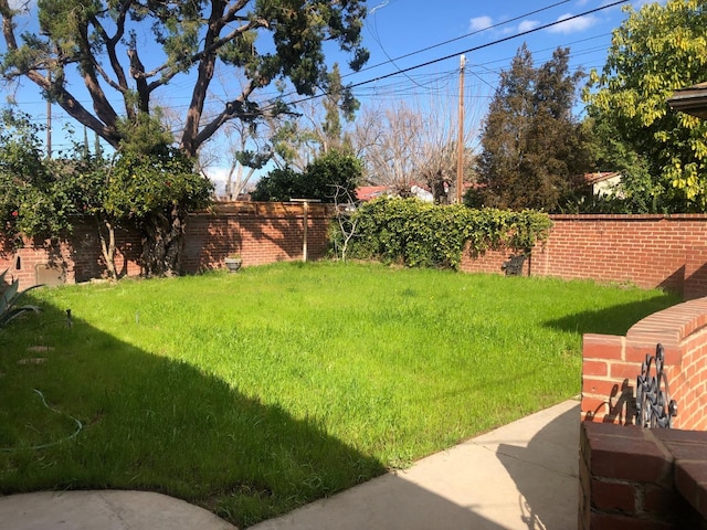 view of yard with fence