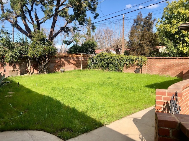 view of yard with fence