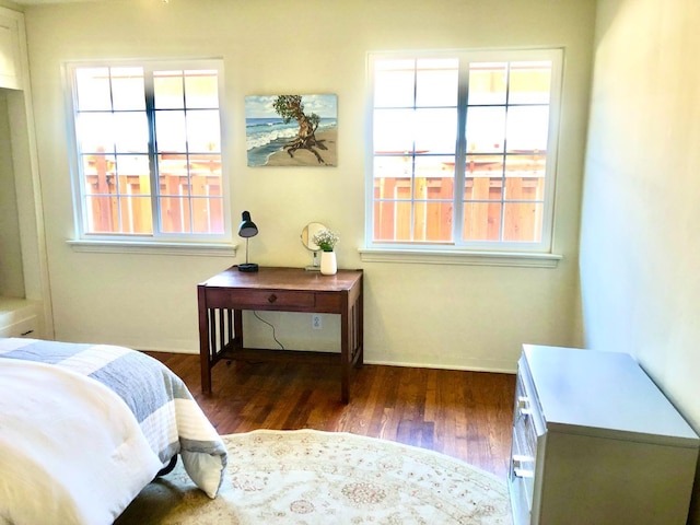 bedroom with wood finished floors