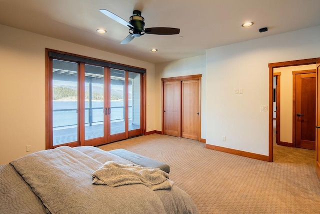 bedroom featuring recessed lighting, access to outside, baseboards, and light colored carpet