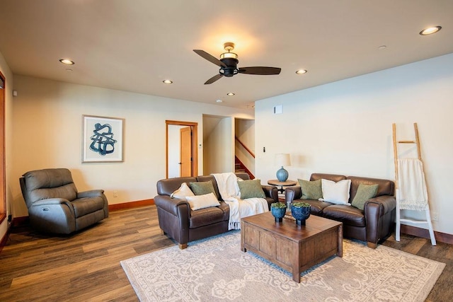 living area featuring recessed lighting, stairway, baseboards, and wood finished floors