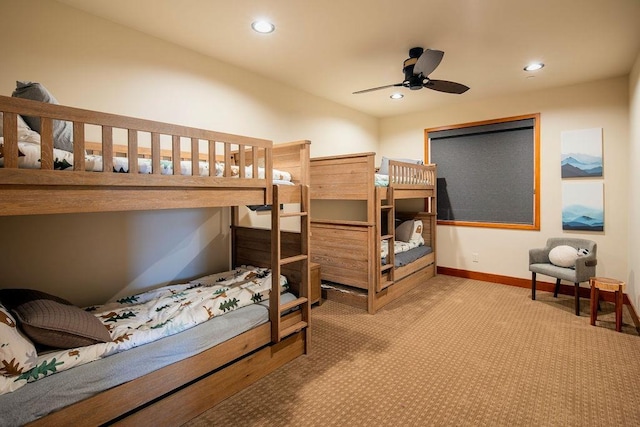 carpeted bedroom featuring recessed lighting, ceiling fan, and baseboards