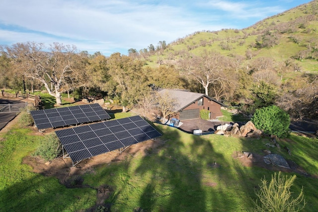 aerial view featuring a mountain view and a wooded view