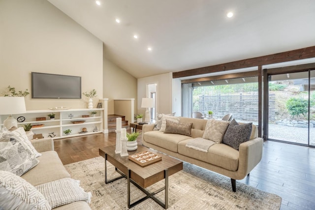 living area featuring high vaulted ceiling, recessed lighting, and wood finished floors