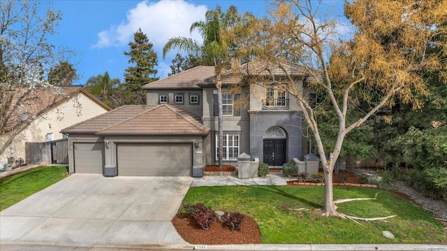 view of front of property with a tiled roof, a front lawn, an attached garage, and a balcony