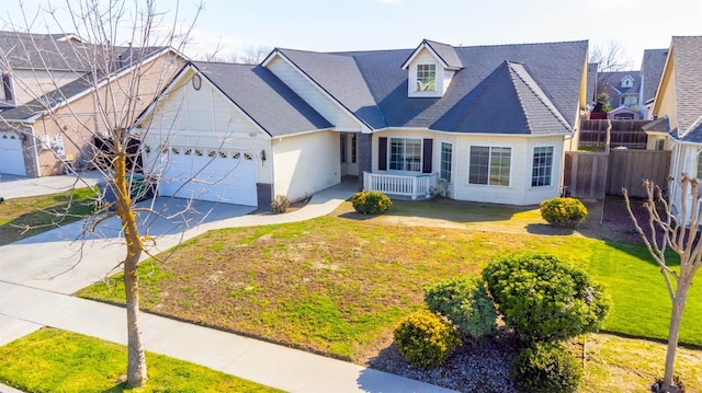 15877 W C St, Kerman, CA 93630 - view of front of property with an attached garage, concrete driveway, and a shingled roof