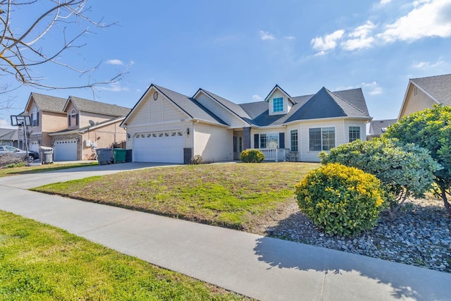 15877 W C St, Kerman, CA 93630 - view of front of home with a garage, concrete driveway, and a front lawn