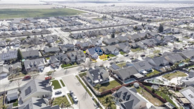 15877 W C St, Kerman, CA 93630 - aerial overview of property's location featuring nearby suburban area