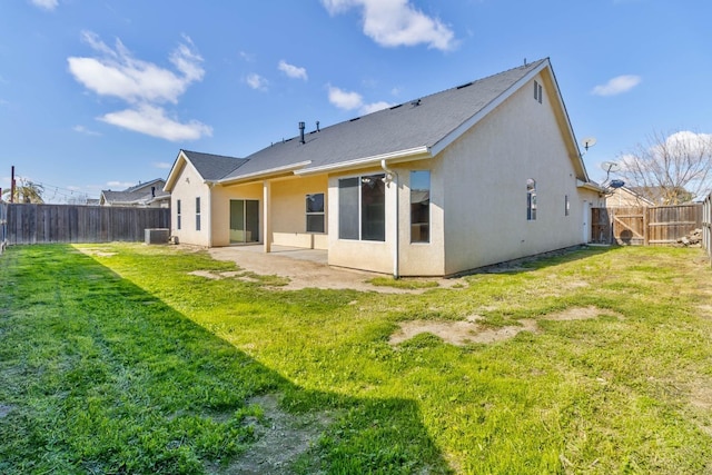 15877 W C St, Kerman, CA 93630 - rear view of property with stucco siding, a fenced backyard, and a patio