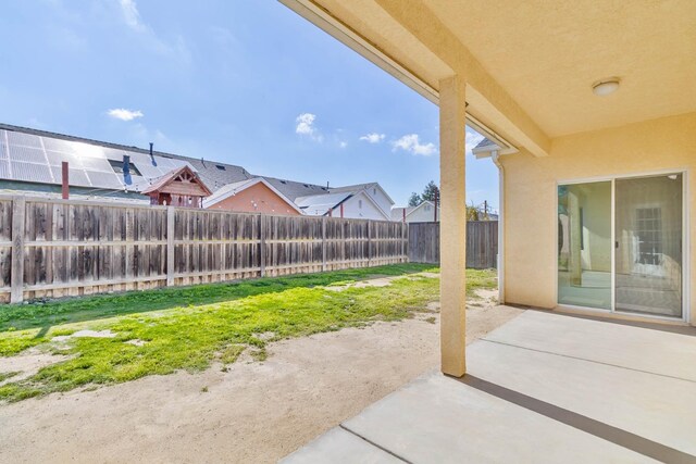 15877 W C St, Kerman, CA 93630 - fenced backyard featuring a patio