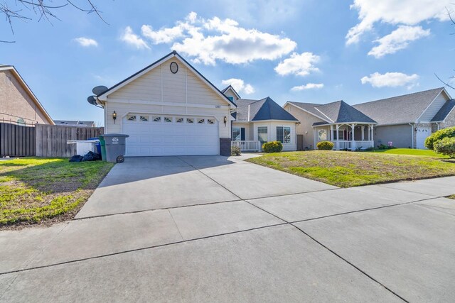 15877 W C St, Kerman, CA 93630 - ranch-style home with concrete driveway and an attached garage