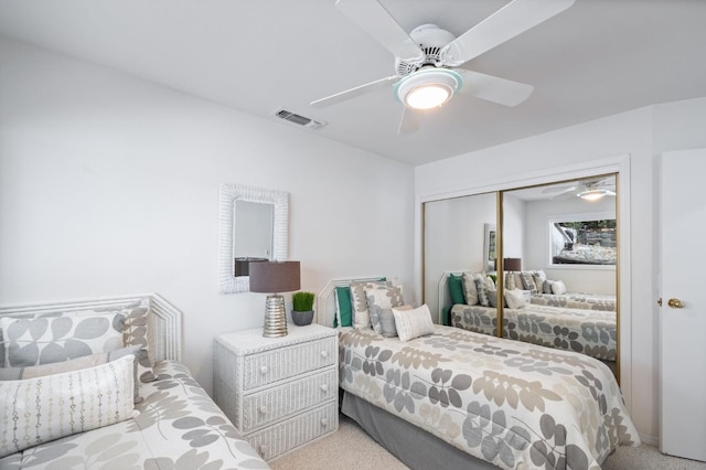39118 Lake Dr, Bass Lake, CA 93604 - bedroom featuring a closet, carpet flooring, and a ceiling fan