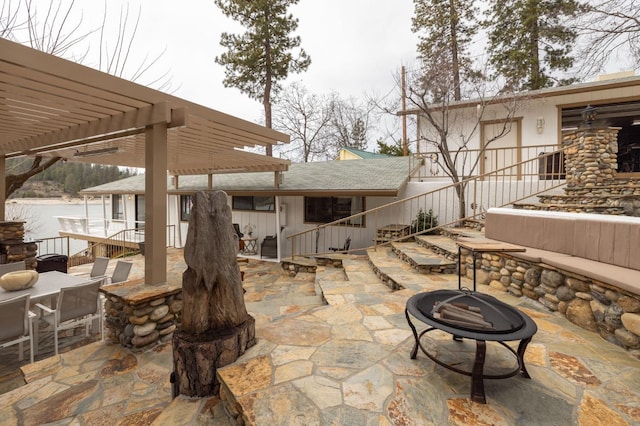 39118 Lake Dr, Bass Lake, CA 93604 - view of patio featuring a fire pit and a pergola