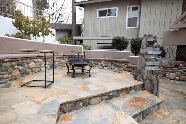 39118 Lake Dr, Bass Lake, CA 93604 - view of patio / terrace with a fire pit