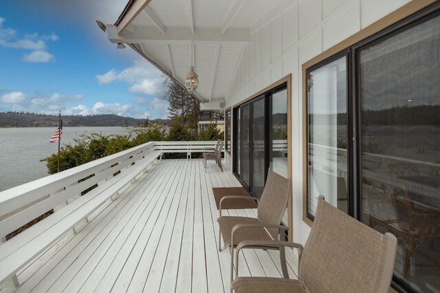 39118 Lake Dr, Bass Lake, CA 93604 - wooden deck featuring a water view