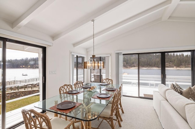 39118 Lake Dr, Bass Lake, CA 93604 - carpeted dining area with a chandelier and a water view