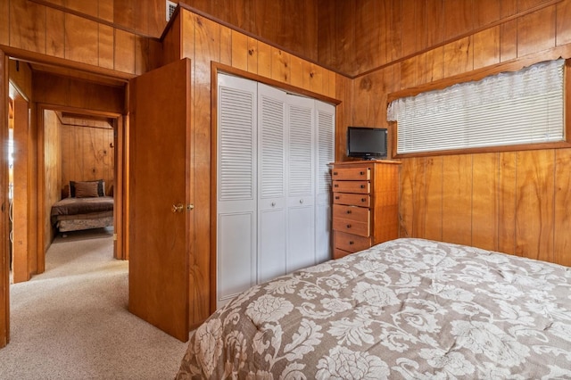 39118 Lake Dr, Bass Lake, CA 93604 - bedroom featuring carpet, wooden walls, and a closet