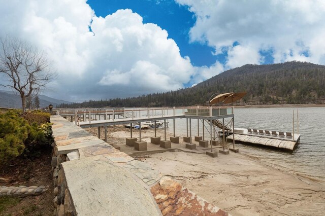 39118 Lake Dr, Bass Lake, CA 93604 - dock area with a water and mountain view and a wooded view