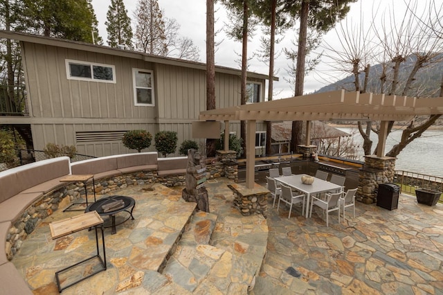 39118 Lake Dr, Bass Lake, CA 93604 - view of patio / terrace featuring a fire pit and outdoor dining area