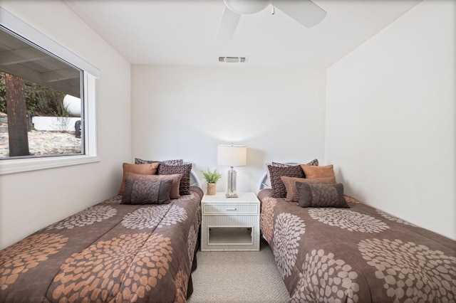 39118 Lake Dr, Bass Lake, CA 93604 - carpeted bedroom with a ceiling fan