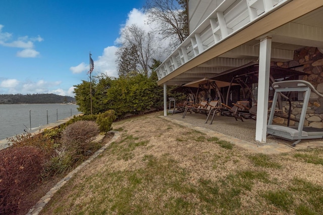 39118 Lake Dr, Bass Lake, CA 93604 - view of yard featuring a water view and a patio
