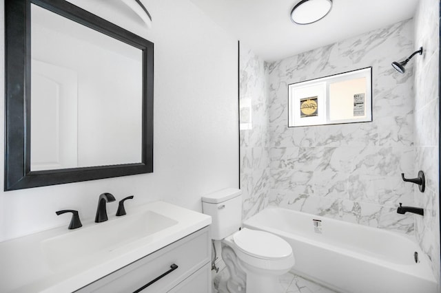 bathroom featuring toilet, marble finish floor, shower / bathtub combination, and vanity