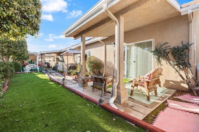 view of yard with a gazebo and a patio