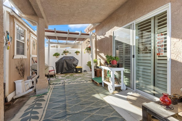 view of patio / terrace with fence and grilling area