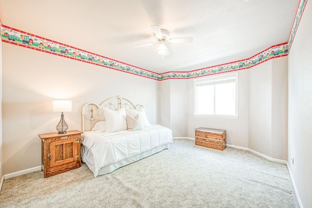 bedroom featuring ceiling fan, carpet floors, and baseboards