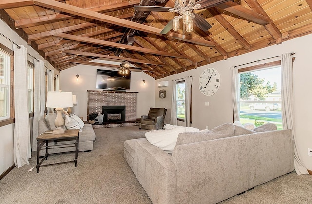 carpeted living room with vaulted ceiling with beams, wooden ceiling, and ceiling fan