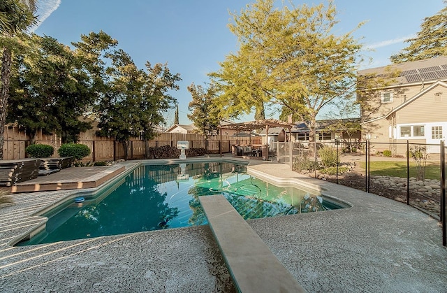 view of swimming pool with a fenced in pool, a patio area, and a fenced backyard