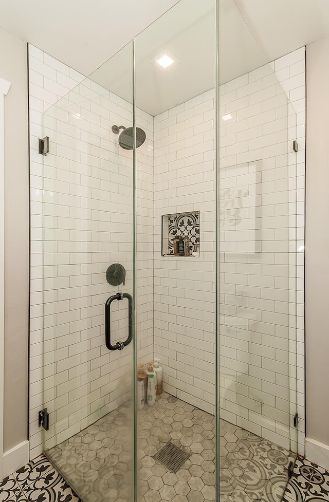 bathroom featuring a stall shower